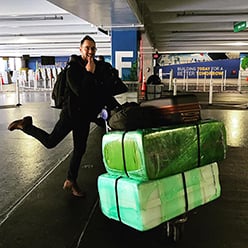 Transporting weirdly-green suitcases in airport, what could be in there ?